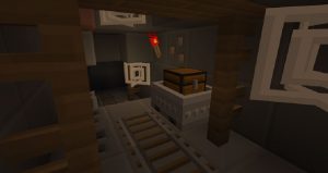 Minecraft cave with rails and a chest in a simplified style.