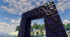 Unlit Nether portal on a realistic beach with sand and water in the background.