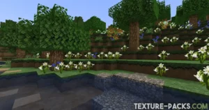 A body of water with modern gravel and polished dirt blocks along the shore, covered with many realistic flowers in Minecraft.