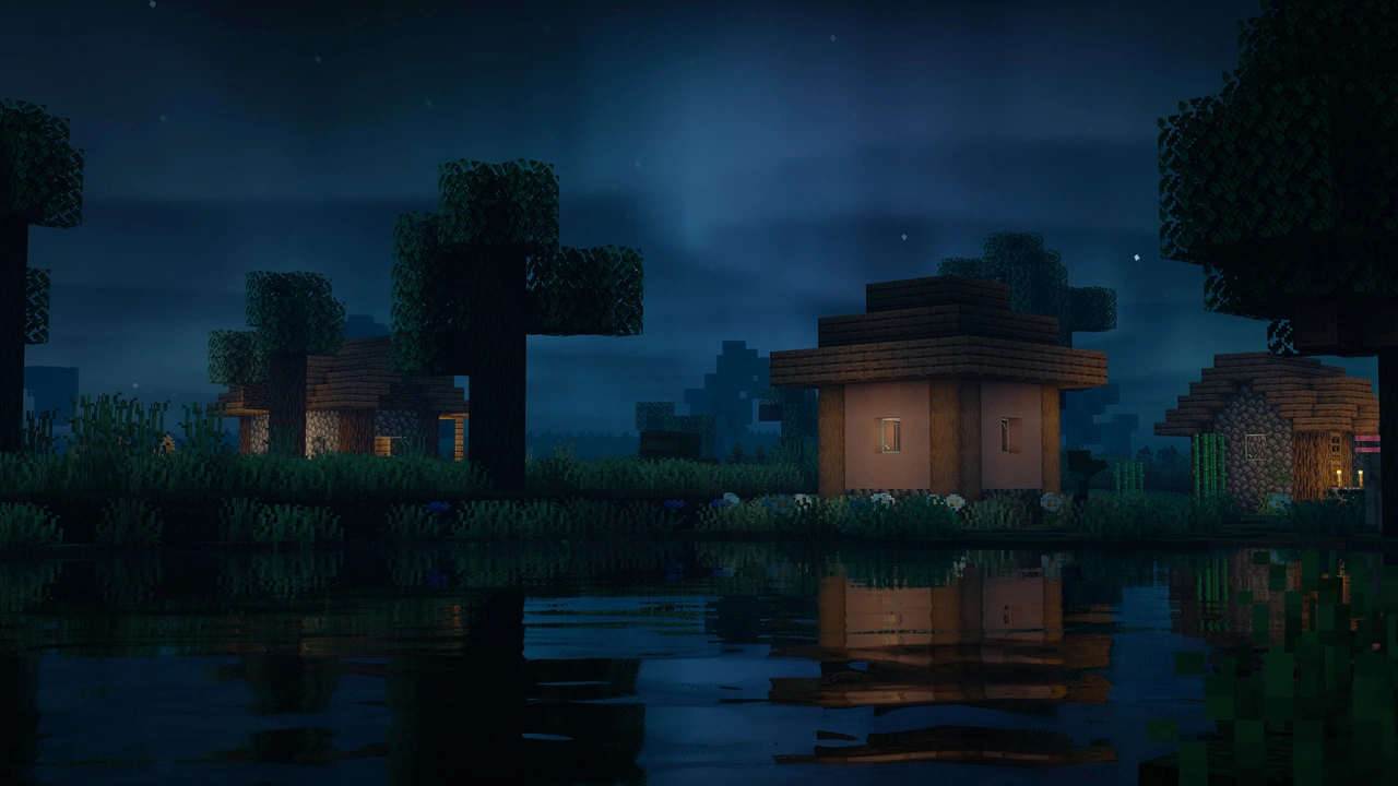 Minecraft village at night with the Lux shaders.