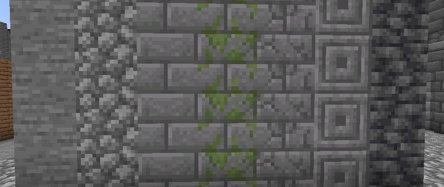 Wall made of various stone types in default Minecraft style.